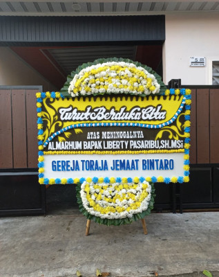 Papan Bunga Duka di Wek I